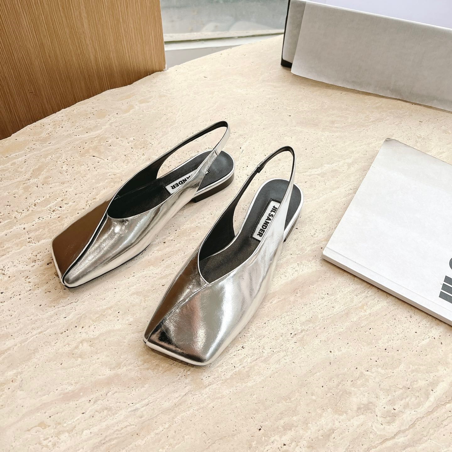 질샌더 슬링백